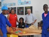 The carpenters present their hand made toys to the children's centre