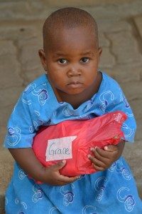 Grace looking suspicious at the idea of a Christmas gift